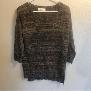 Shimmery, shiny, sparkly knit quarter-sleeve top